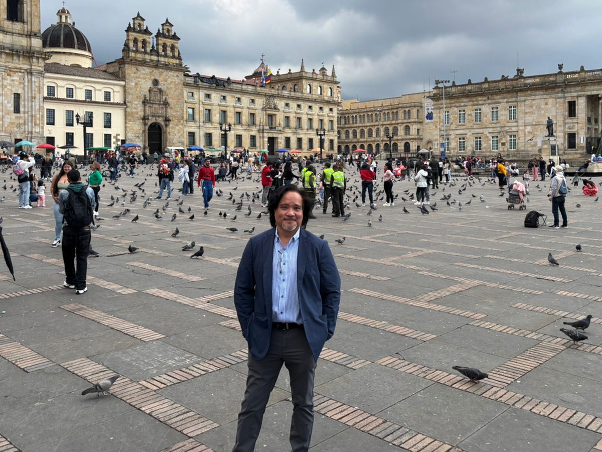 James Paat in an international setting representing global relationships and international market connections